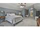 Large bedroom with vaulted ceilings featuring carpet and gray walls at 49 Moss Cts, Palmetto, GA 30268