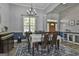 Dining room showcasing natural light, modern lighting, and an open layout at 49 Moss Cts, Palmetto, GA 30268