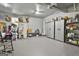 Spacious garage featuring high ceilings and ample storage solutions at 49 Moss Cts, Palmetto, GA 30268