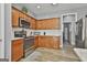 Chef's kitchen featuring a modern backsplash and plenty of cabinet space at 49 Moss Cts, Palmetto, GA 30268
