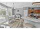 Charming kitchen and breakfast nook with stainless steel appliances and granite countertops at 49 Moss Cts, Palmetto, GA 30268