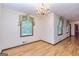 Bright dining room with large windows, recessed lights, and chandelier at 8289 Lake View Ter, Riverdale, GA 30274