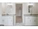 Bathroom boasts double sink vanity with granite countertops and marble floors at 115 Stewart Hollow Ln, Covington, GA 30016