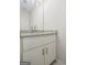 Close up view of the half bathroom and granite countertop at 115 Stewart Hollow Ln, Covington, GA 30016