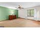 Spacious bedroom with a ceiling fan and natural light at 370 Merrydale Dr, Fayetteville, GA 30215