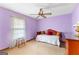 Bedroom featuring a twin daybed, a carpet floor, and a ceiling fan at 370 Merrydale Dr, Fayetteville, GA 30215