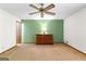 Inviting bedroom featuring a ceiling fan and carpeted floors at 370 Merrydale Dr, Fayetteville, GA 30215