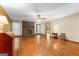 Inviting living room featuring a brick fireplace and gleaming hardwood floors at 370 Merrydale Dr, Fayetteville, GA 30215