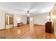 Spacious living room featuring hardwood floors and access to other rooms in the home at 370 Merrydale Dr, Fayetteville, GA 30215