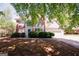 Charming two-story home with brick and siding, a blue front door, and well-manicured landscaping at 1417 Se Pickett'S Ct, Conyers, GA 30013