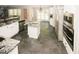 Bright kitchen with marble island, and stainless steel appliances; modern design at 1417 Se Pickett'S Ct, Conyers, GA 30013