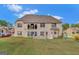 Spacious backyard of a two-story brick home, perfect for outdoor activities and relaxation at 3705 Royer Ln, Hampton, GA 30228