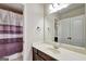 Bathroom with shower/tub, vanity with mirror, towel rack and white walls at 3705 Royer Ln, Hampton, GA 30228