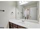 Bathroom with vanity, large mirror, and towel rack with a view of the toilet at 3705 Royer Ln, Hampton, GA 30228