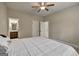 Bedroom with carpet, ceiling fan and bathroom ensuite at 3705 Royer Ln, Hampton, GA 30228