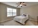 Bedroom with carpet, neutral walls and a ceiling fan with bright window light at 3705 Royer Ln, Hampton, GA 30228