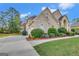 Beautiful two-story brick home with an attached garage and professionally landscaped yard in a desirable neighborhood at 3705 Royer Ln, Hampton, GA 30228