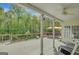 Spacious back deck overlooking a lush, wooded backyard and outdoor dining at 140 Horton Creek Trl, Brooks, GA 30205
