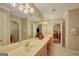 Bright bathroom featuring a double sink vanity with a large mirror and plenty of counter space at 140 Horton Creek Trl, Brooks, GA 30205
