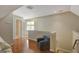 Upstairs bonus room with hardwood floors, a pitched ceiling and natural light at 140 Horton Creek Trl, Brooks, GA 30205