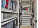 Custom walk-in closet with built-in shelving and drawers for optimal organization at 308 Summer Pl, Peachtree City, GA 30269