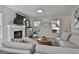 Comfortable living room with a fireplace, television, and inviting seating arrangement at 308 Summer Pl, Peachtree City, GA 30269