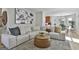 Comfortable living room with a large sectional sofa, accent pillows, and stylish decor at 308 Summer Pl, Peachtree City, GA 30269