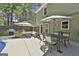 Outdoor patio with comfortable seating and a grill, ideal for entertaining and relaxation at 308 Summer Pl, Peachtree City, GA 30269