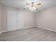 Spacious bedroom with modern floors and a ceiling fan for added comfort at 5882 Trent Walk Dr, Lithonia, GA 30038