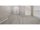 Bonus room with ample space, bright lighting, and view to the second floor at 5882 Trent Walk Dr, Lithonia, GA 30038