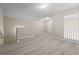Bonus room area featuring a staircase and ample space for activities or storage at 5882 Trent Walk Dr, Lithonia, GA 30038