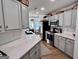 Bright kitchen featuring stainless steel appliances, spacious countertops, and an open layout at 403 Rock Creek Dr, Peachtree City, GA 30269