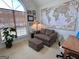 Cozy office area featuring a seating area, world map, and large window providing ample light at 403 Rock Creek Dr, Peachtree City, GA 30269