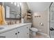 Stylish bathroom featuring elegant vanity, fixtures, and walk-in shower at 423 Bear Creek Trl, Hampton, GA 30228