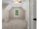 Cozy bedroom with neutral carpet and vaulted ceilings at 423 Bear Creek Trl, Hampton, GA 30228