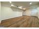 Spacious basement area with hardwood floors, white walls, and recessed lighting at 2571 Stanford Dr, Ellenwood, GA 30294
