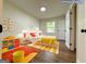 Virtual Staging: Charming bedroom with bright decor and plenty of storage space at 2571 Stanford Dr, Ellenwood, GA 30294