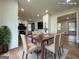 Virtual Staging: Dining area with modern table setting and ample natural light at 2571 Stanford Dr, Ellenwood, GA 30294