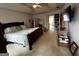 Spacious main bedroom with tray ceiling, king bed, and lots of closet space at 187 Pine Branch Dr, Stockbridge, GA 30281