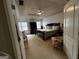 Comfortable main bedroom features a tray ceiling, large bed, and plenty of closet space at 187 Pine Branch Dr, Stockbridge, GA 30281