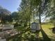 Expansive backyard featuring a storage shed, offering ample space and outdoor amenities at 2836 Belaire Cir, Doraville, GA 30340