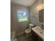 A bright bathroom offers a stylish vanity and updated fixtures at 2836 Belaire Cir, Doraville, GA 30340