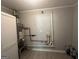 Functional utility room with a water heater and clean, neutral finishes for practicality and efficiency at 2836 Belaire Cir, Doraville, GA 30340