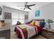 Bedroom with a ceiling fan, neutral paint, and a comfortable bed at 122 Ardenlee Dr, Peachtree City, GA 30269
