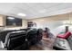 Cozy home theater with comfortable seating, large screen, and accent lighting for immersive entertainment at 122 Ardenlee Dr, Peachtree City, GA 30269