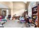 Bright living room with beige walls, shuttered windows, and unique decorations at 122 Ardenlee Dr, Peachtree City, GA 30269