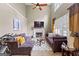 Living room with high ceilings, a fireplace, and comfortable seating at 122 Ardenlee Dr, Peachtree City, GA 30269