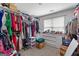 Spacious walk-in closet featuring built-in shelving and ample storage space for clothes and accessories at 122 Ardenlee Dr, Peachtree City, GA 30269