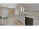 Bright eat-in kitchen features white cabinets, stainless steel appliances, and ample counter space at 8032 Highland Pkwy, Fairburn, GA 30213