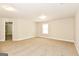 Spacious bedroom with neutral walls and carpet, offering a bright and inviting atmosphere at 1700 Cobblefield Cir, Dacula, GA 30019